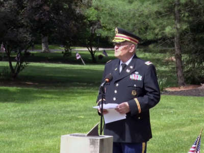 Retired Army Lt. Col. Barnard Kemter speaks at a Memorial Day event in an Ohio cemetery on May 31, 2021. Kemter's microphone was turned off as he began to speak about Black people's role in the history of the holiday.
