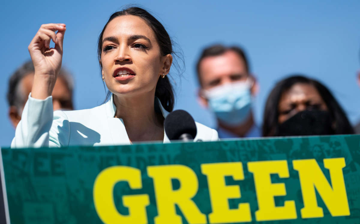 Rep. Alexandria Ocasio-Cortez speaks at a news conference at the Capitol Reflecting Pool near the West Front of the U.S. Capitol Building on April 20, 2021, in Washington, D.C.