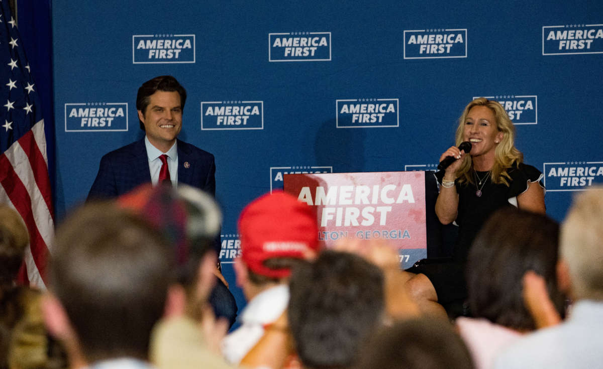 Representatives Matt Gaetz and Marjorie Taylor Greene speak at an "America First" rally on May 27, 2021, in Dalton, Georgia.