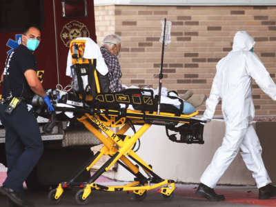 A patient is transported to the emergency department by paramedics