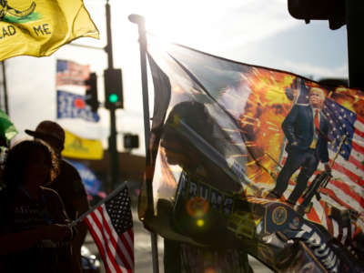 Protestors in support of former President Donald Trump gather outside Veterans Memorial Coliseum where Ballots from the 2020 general election wait to be counted on May 1, 2021, in Phoenix, Arizona.