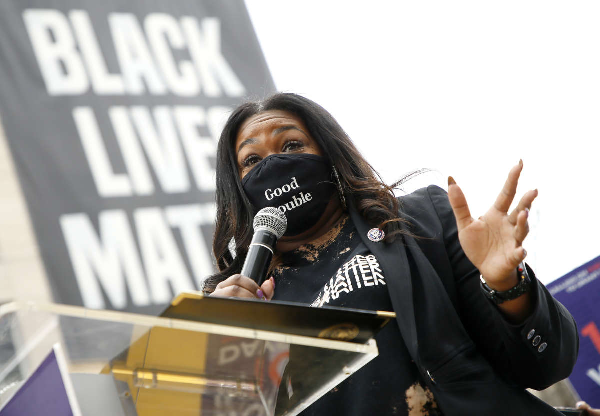 Rep. Cori Bush (D-Missouri) speaks at The National Council for Incarcerated Women and Girls "100 Women for 100 Women" rally in Black Lives Matter Plaza near The White House on March 12, 2021.