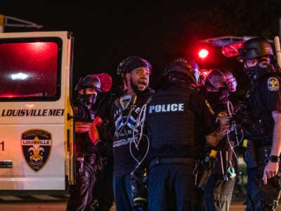 A demonstrator is arrested on September 26, 2020, in Louisville, Kentucky. GOP legislators in Kentucky have since passed a bill to criminalize protest.