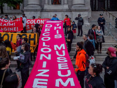 Activists lead an Anti-Columbus Day Tour at the American Museum of Natural History on October 8, 2018, in New York City.