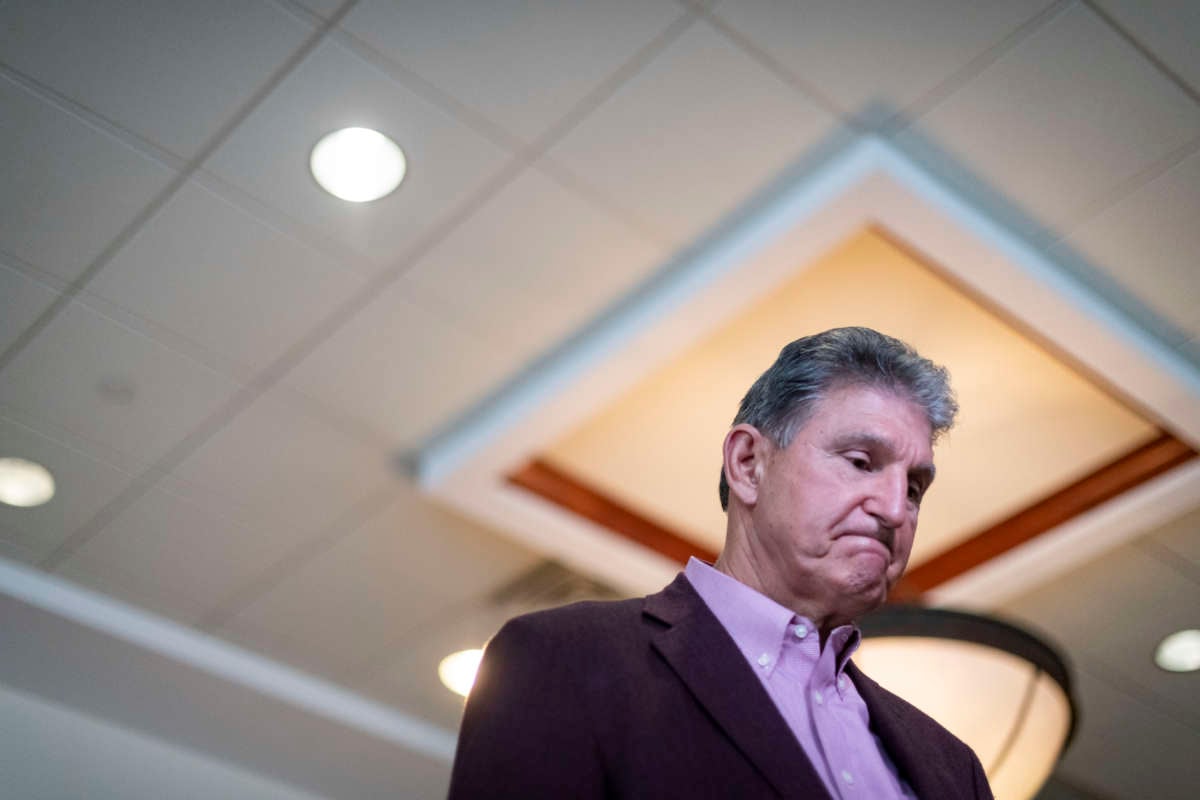 Sen. Joe Manchin is interviewed after a news conference at the Marriott Hotel at Waterfront Place on June 3, 2021, in Morgantown, West Virginia.