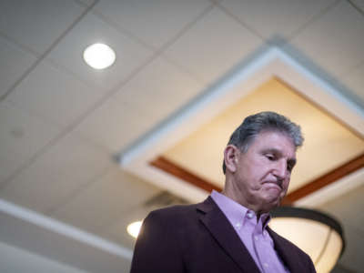 Sen. Joe Manchin is interviewed after a news conference at the Marriott Hotel at Waterfront Place on June 3, 2021, in Morgantown, West Virginia.