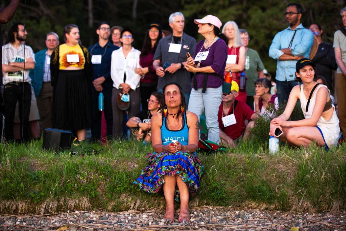 Environmental activist Winona LaDuke prays at the conclusion of the Treaty People Gathering, where the faith leaders' welcome talk and sunset prayer circle are held in protest of the Line 3 pipeline at Northern Pines Camp in Park Rapids, Minnesota, on June 5, 2021.
