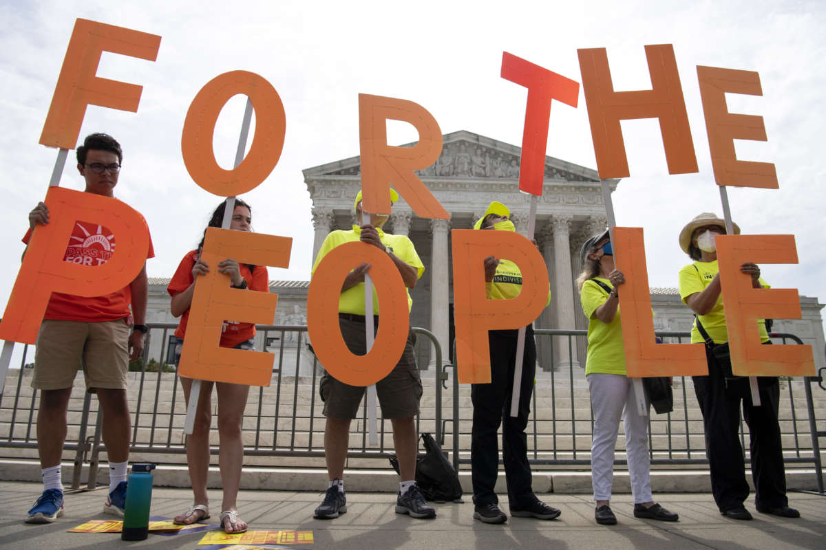 The Declaration for American Democracy coalition hosts a rally calling on the Senate to pass the For the People Act outside the Supreme Court in Washington, D.C., on June 9, 2021.