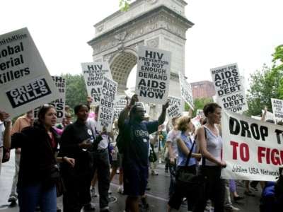 Participants in the Global Day of Action AIDS march and rally set out from Washington Square Park on the way to Sixth Ave in New York City, circa 2000.