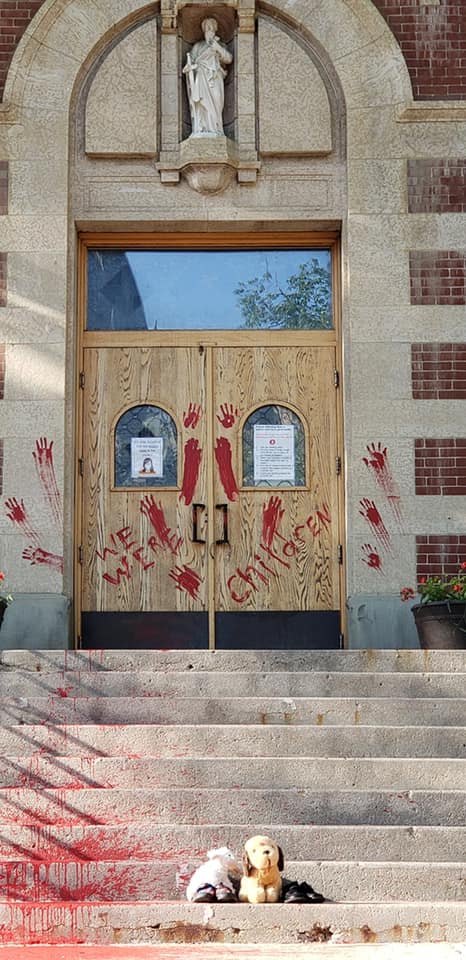 A powerful message painted on the front of St. Paul’s Cathedral in Saskatoon, Saskatchewan, on June 25, 2021