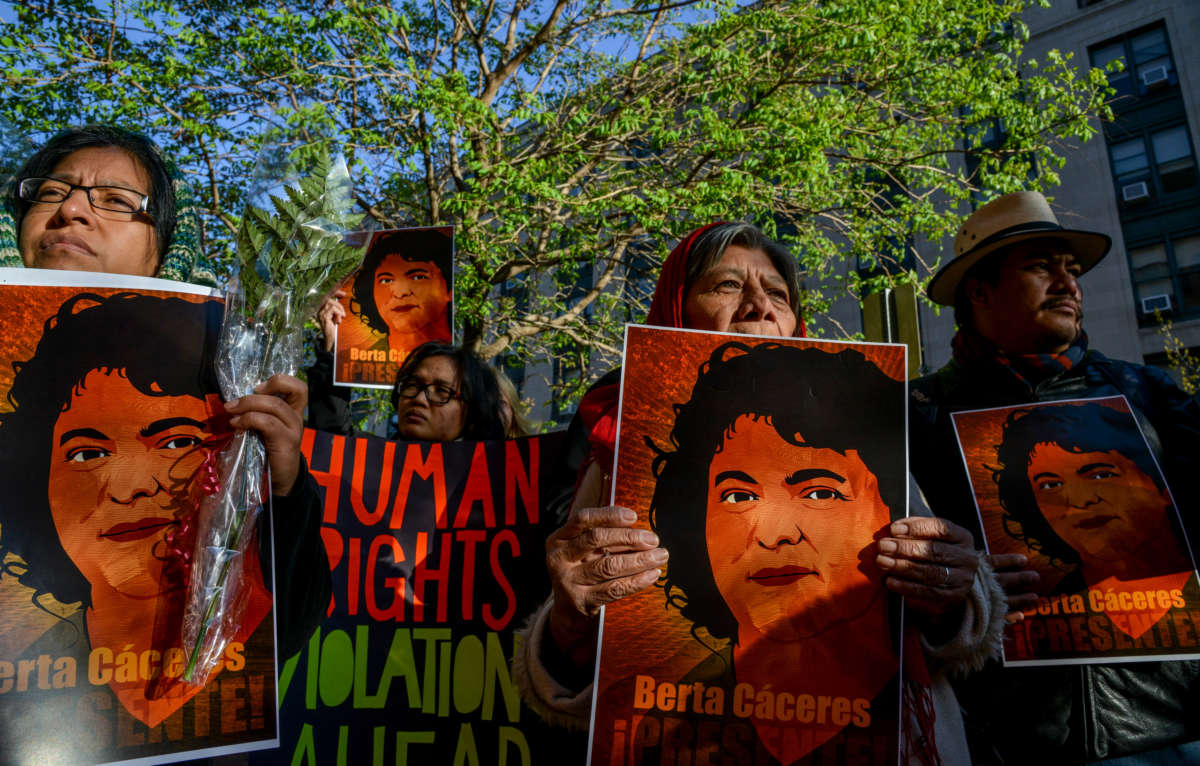 Environmental activists gather in front of the Office of American States in honor of prominent indigenous activist Berta Cáceres, on April 5, 2016, in Washington, D.C.