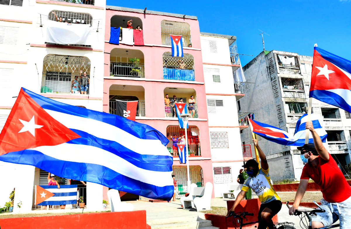 People participate in a rally against the U.S. embargo of Cuba on April 25, 2021, in Santa Clara, Cuba.