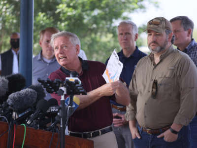 Sen. Lindsey Graham speaks to the media after a tour of part of the Rio Grande on a Texas Department of Public Safety boat on March 26, 2021, in Mission, Texas.
