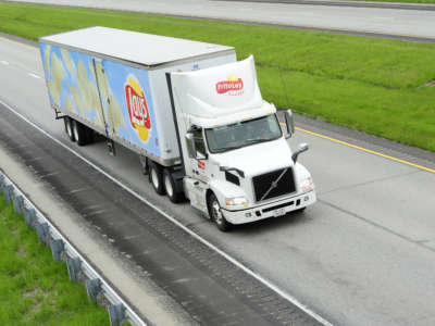 Frito-Lay snack foods move along by tractor-trailer on Interstate 74 during the COVID-19 pandemic, on May 4, 2020, in Veedersburg, Indiana.