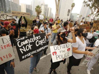 Los Angeles Unified School District (LAUSD) teachers join members of Black Lives Matter-Los Angeles and their supporters as they hold a demonstration outside LAUSD headquarters on Tuesday, June 23, 2020, in Los Angeles, CA.