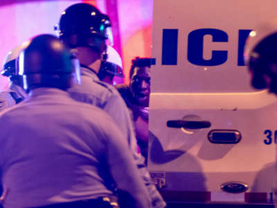 Police arrest a protester in West Philadelphia on October 27, 2020, during a demonstration against the fatal shooting of 27-year-old Walter Wallace, a Black man, by police. Wallace's family said he suffered mental health issues.