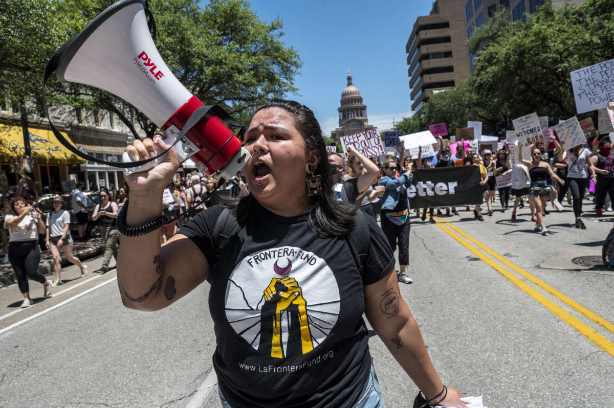 Protesters demonstrate against a new bill outlawing abortions after a fetal heartbeat outside the Texas state capitol on May 29, 2021, in Austin, Texas.