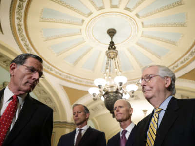 Sen. John Barrasso, Senate Minority Whip Sen. John Thune, Sen. Rick Scott and Senate Minority Leader Sen. Mitch McConnell appear during a news briefing after the weekly Senate Republican Policy Luncheon at the U.S. Capitol, on June 22, 2021, in Washington, D.C.
