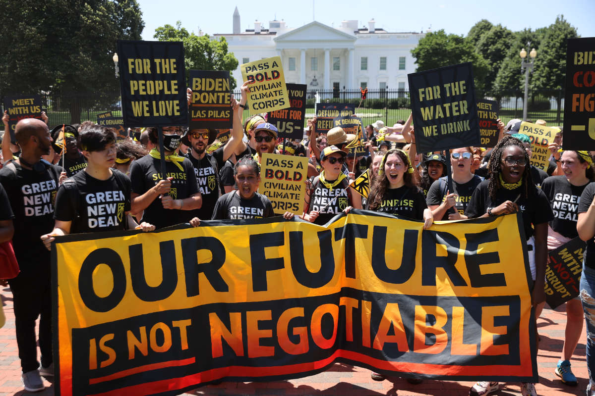 Hundreds of young climate activists rally in Lafayette Square on the north side of the White House to demand that President Joe Biden work to make the Green New Deal into law on June 28, 2021, in Washington, D.C.