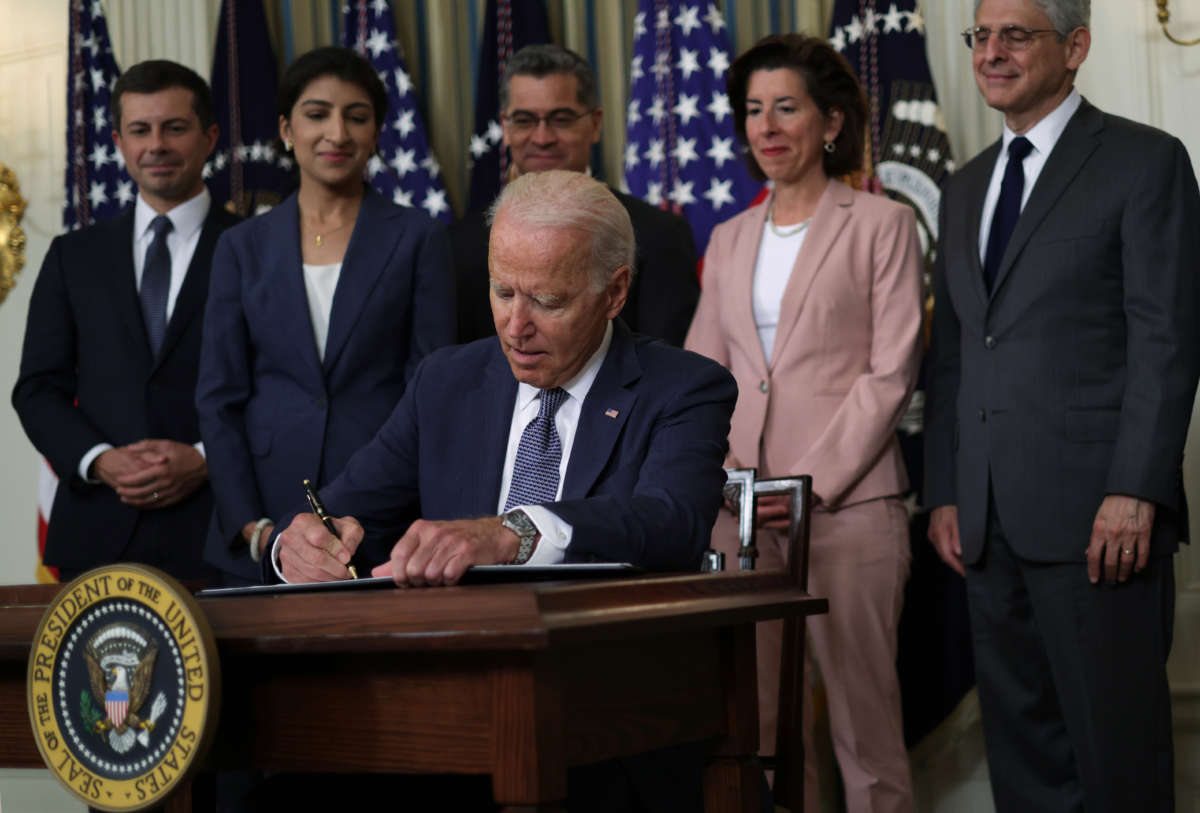 President Joe Biden signs an executive order on “promoting competition in the American economy" at the State Dining Room of the White House on July 9, 2021, in Washington, D.C.