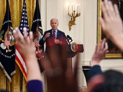 Joe Biden calls on reporters raising their hands