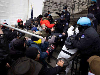 pro-trump rioters rush cops on the steps of the u.s. capitol