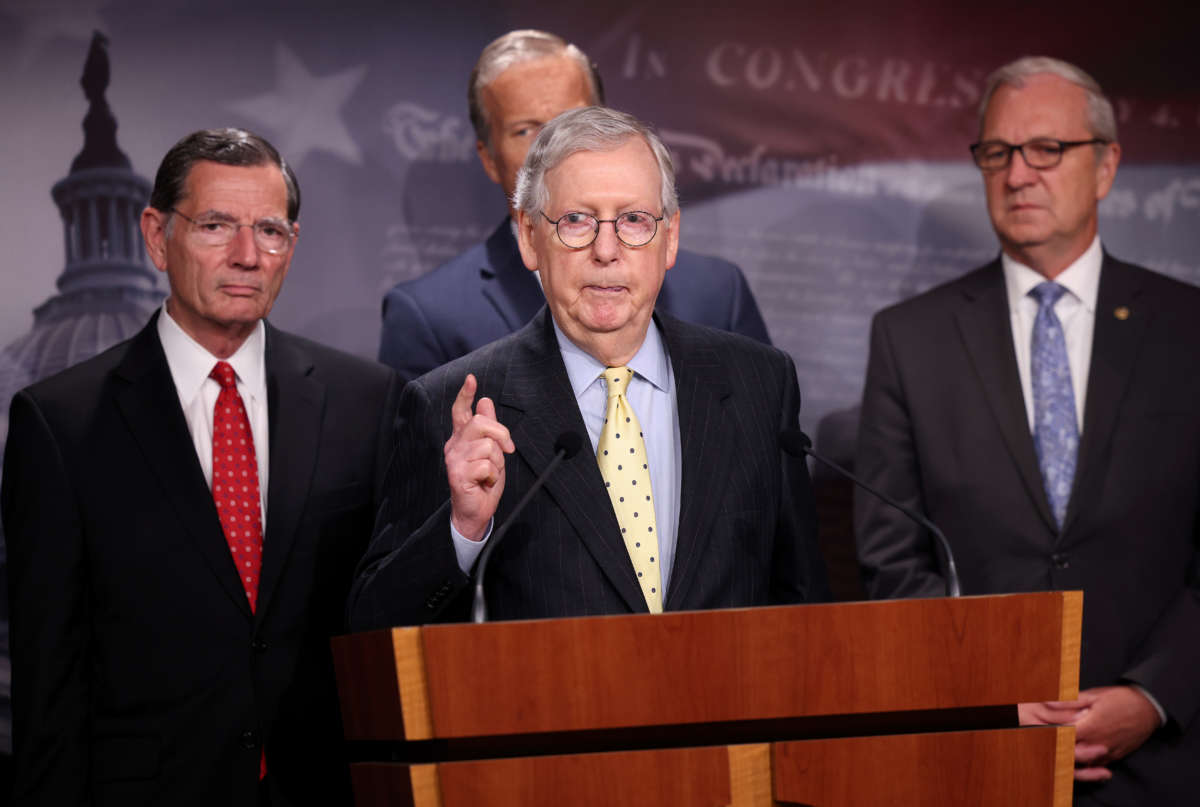 Senate Minority Leader Mitch McConnell (R-Kentucky), joined by fellow Republican Senators, speaks on a proposed Democratic tax plan during a press conference at the U.S. Capitol on August 04, 2021 in Washington, D.C.