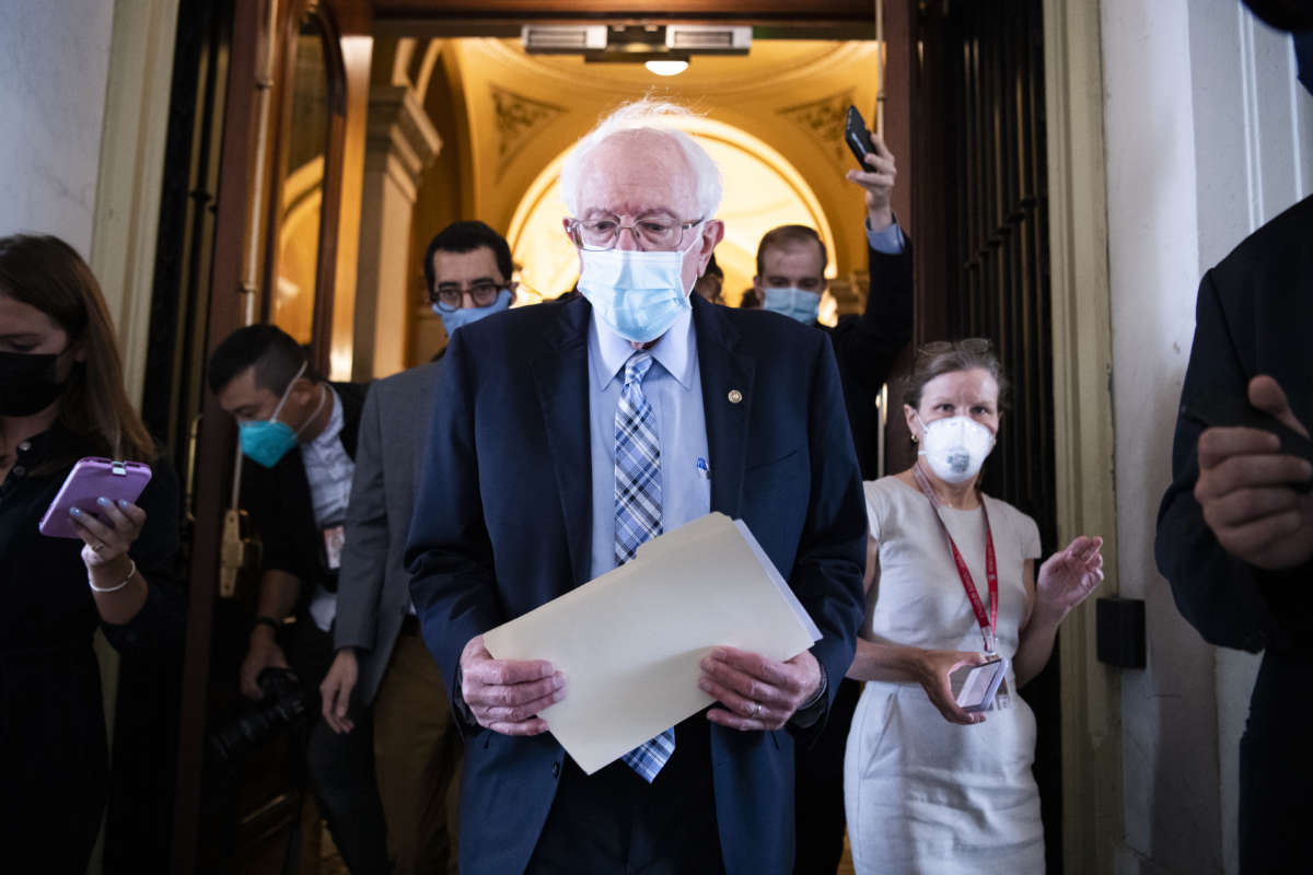 Sen. Bernie Sanders (I-Vermont), talks with reporters while leaving the U.S. Capitol on Monday, August 9, 2021.