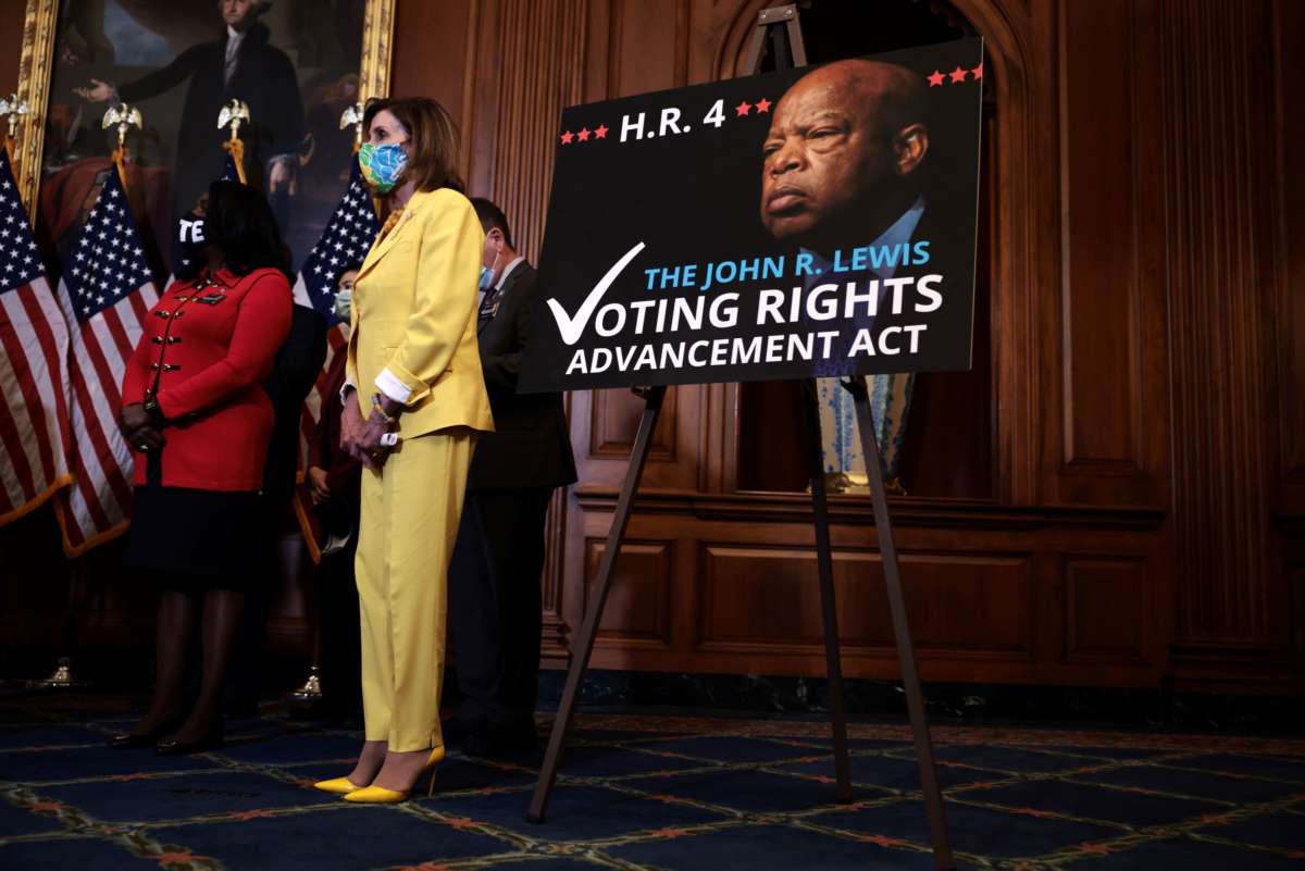 House Speaker Nancy Pelosi (D-California) listens at a press event following the House of Representatives vote on H.R. 4, the John Lewis Voting Rights Advancement Act, at the U.S. Capitol on August 24, 2021 in Washington, D.C.