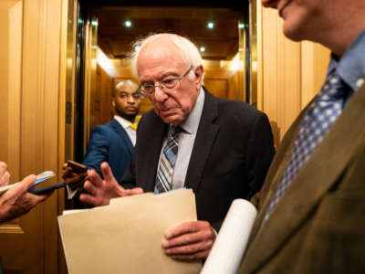 Sen. Bernie Sanders (I-Vermont) speaks with reporters in the Senate side of the U.S. Capitol Building on Wednesday, July 21, 2021.