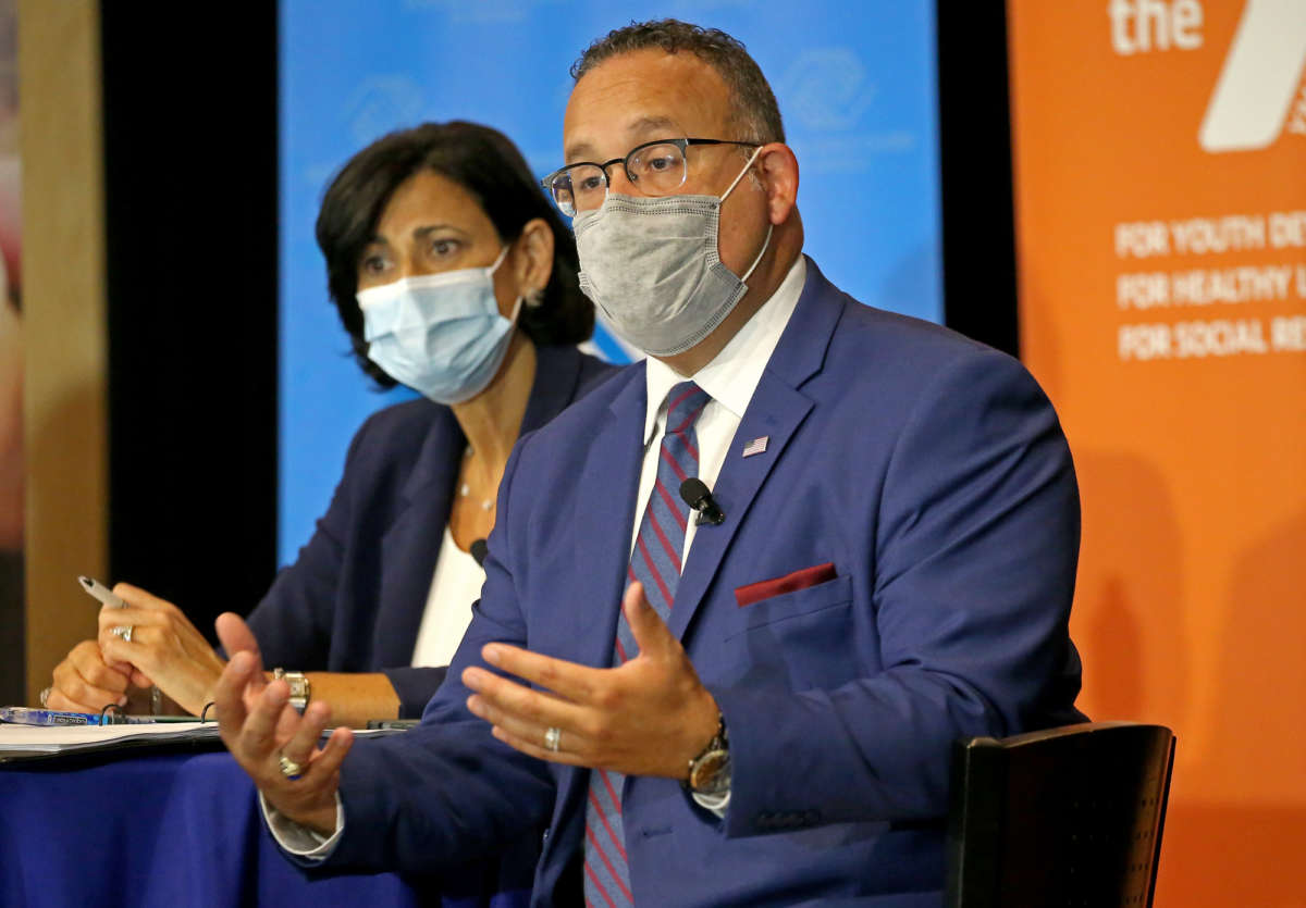 Director of the CDC Rochelle Walensky and Secretary of Education Miguel Cardona at a forum on August 6, 2021 in Roxbury, Boston, Massachusetts.