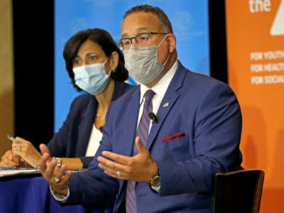 Director of the CDC Rochelle Walensky and Secretary of Education Miguel Cardona at a forum on August 6, 2021 in Roxbury, Boston, Massachusetts.