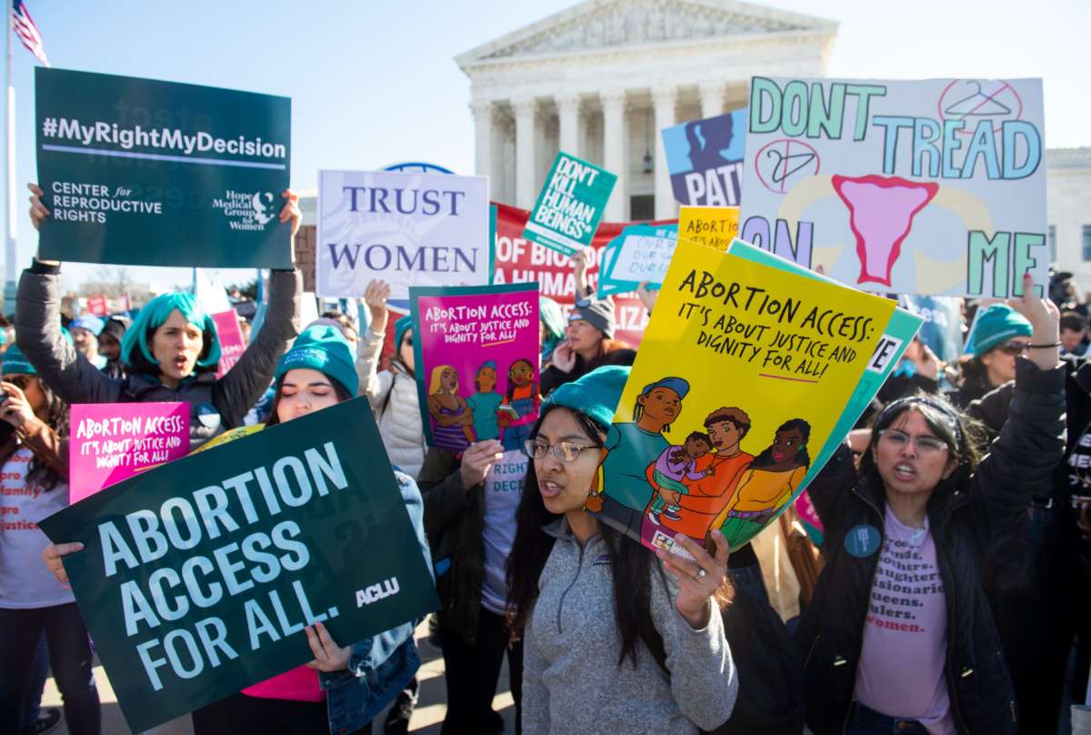 Pro-choice activists supporting legal access to abortion protest during a demonstration outside the Supreme Court in Washington, D.C., on March 4, 2020.