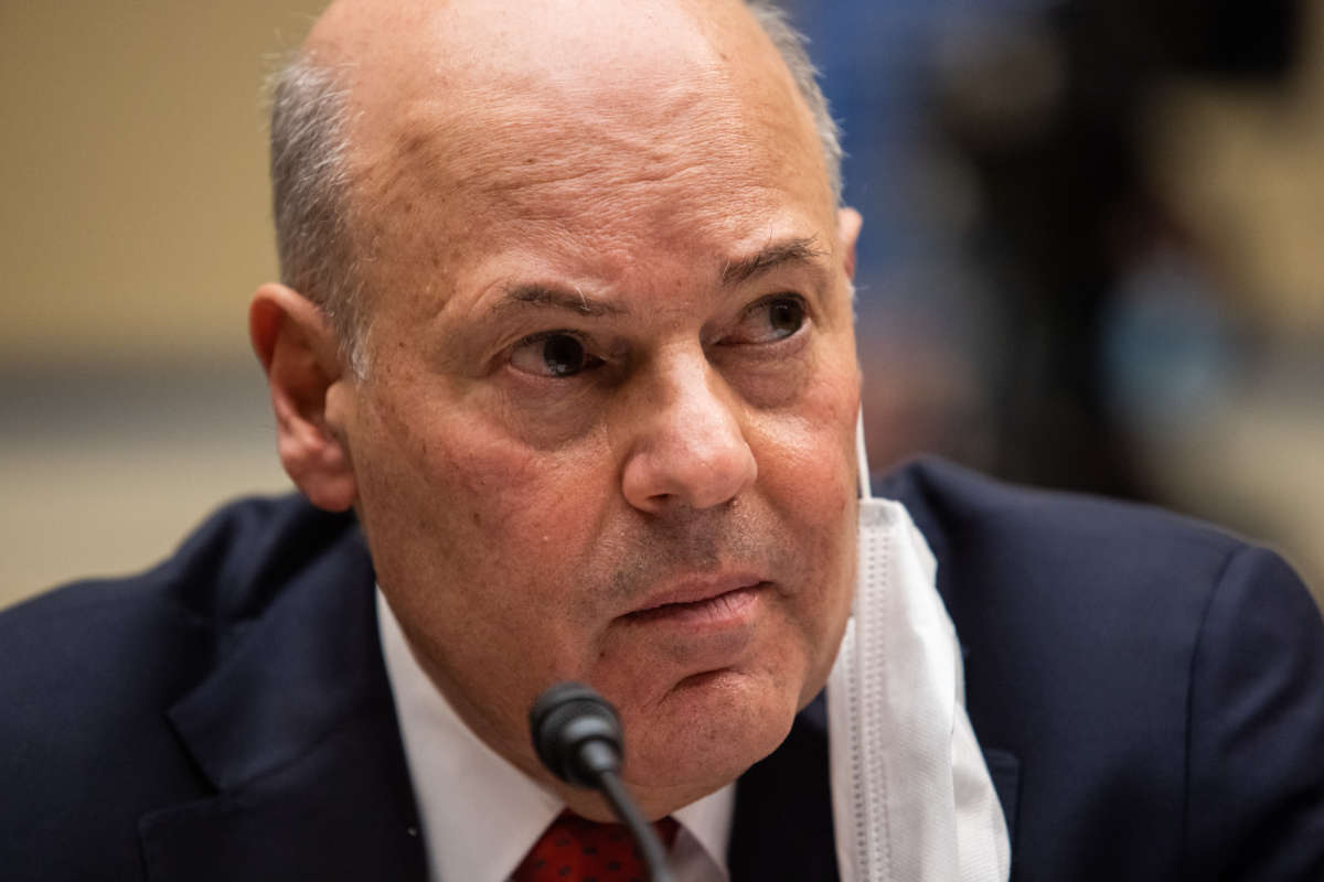 United States Postmaster General Louis Dejoy looks on during a House Committee on Oversight and Reform hearing on February 24, 2021, in Washington, D.C.