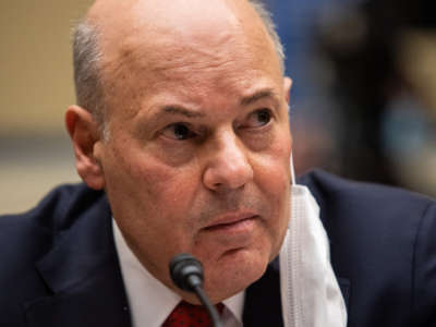 United States Postmaster General Louis Dejoy looks on during a House Committee on Oversight and Reform hearing on February 24, 2021, in Washington, D.C.