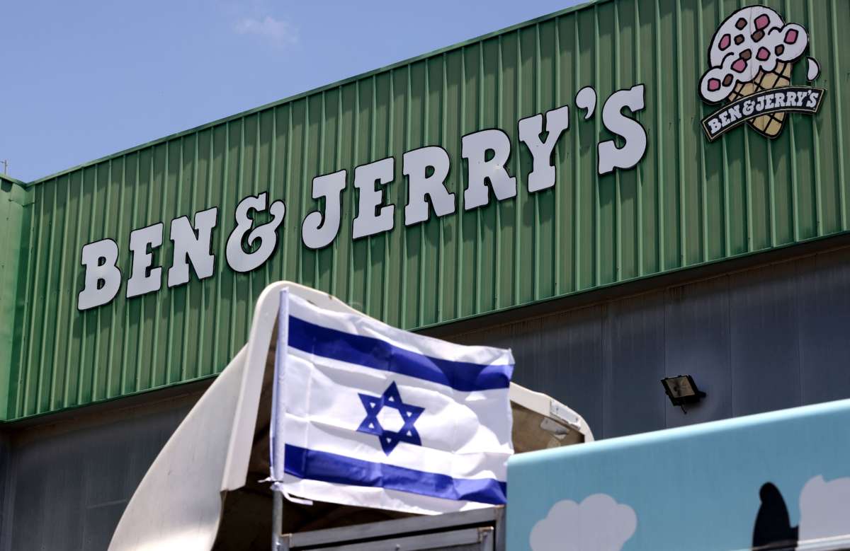 An Israeli flag is set atop a delivery truck outside U.S. ice-cream maker Ben and Jerry's factory in Be'er Tuvia, Israel, on July 21, 2021.