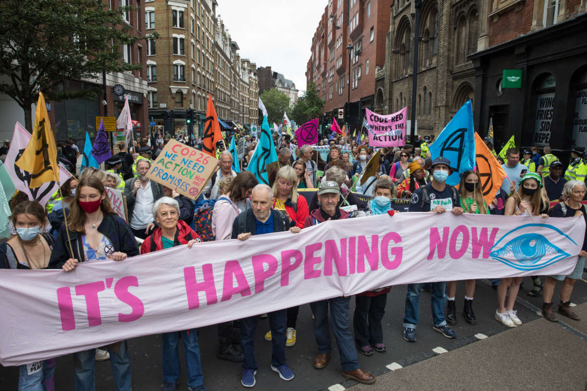 Environmental activists from Extinction Rebellion march from Trafalgar Square during the first day of Impossible Rebellion protests on August, 23, 2021 in London, United Kingdom.