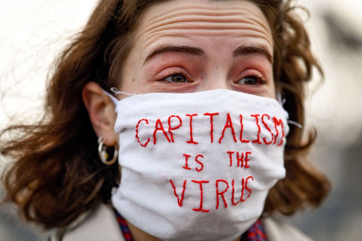 Activists hold a demonstration marking the delayed COP26 UN climate negotiations on November 13, 2020, in Glasgow, Scotland. The 26th United Nations Climate Change conference was delayed for a year due to the COVID-19 pandemic.