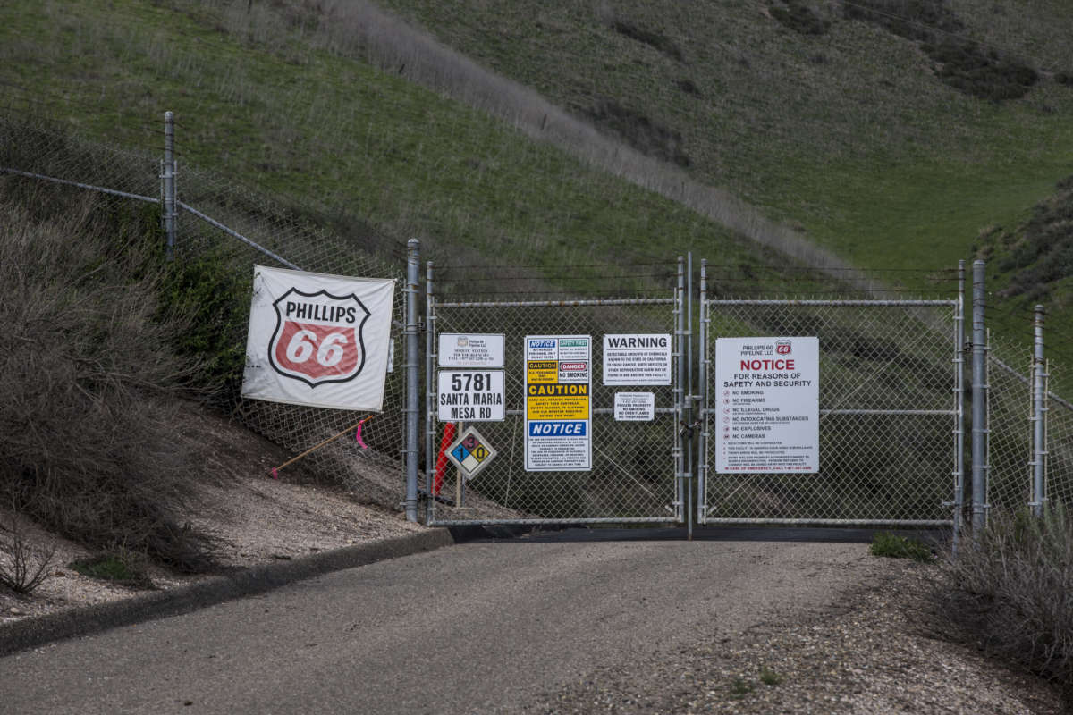 Oil pipelines and drilling equipment at a Phillips 66 facility are tucked into the hills east of Santa Maria, California, as viewed on April 6, 2018.