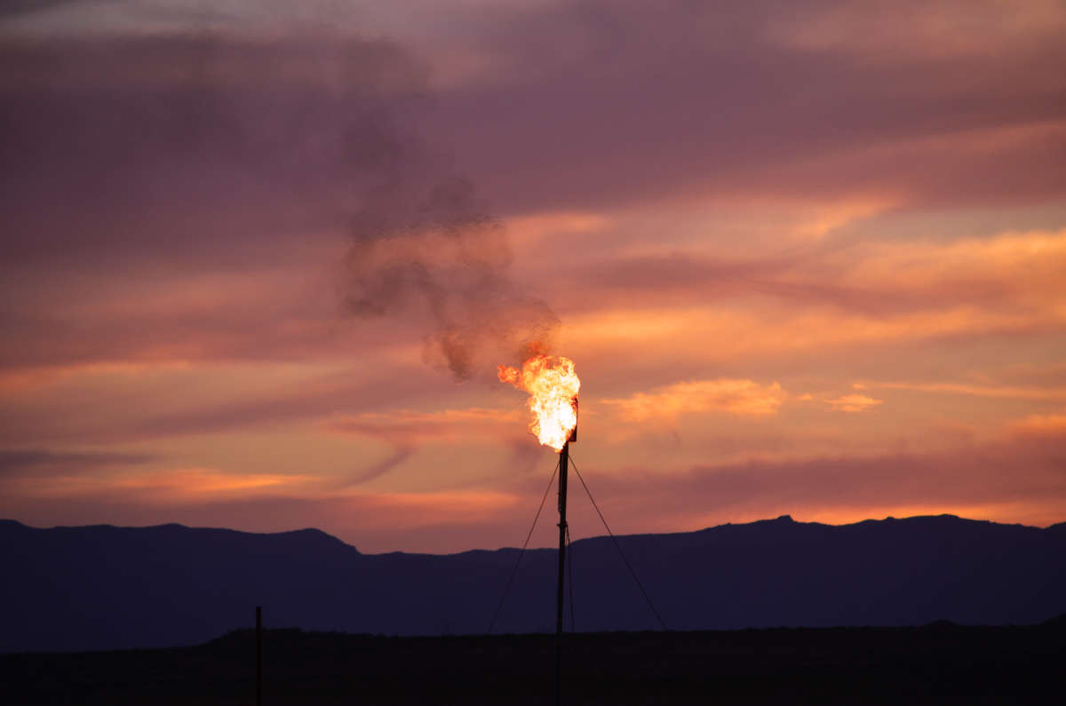 A flare burns at an Apache facility near Balmorhea, Texas, on April 2, 2017.