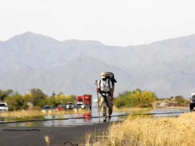 Rory Fanning walking across Arizona in 2009 in memory of Pat Tillman, the NFL player who was killed by “friendly fire” while serving in Afghanistan in 2004.