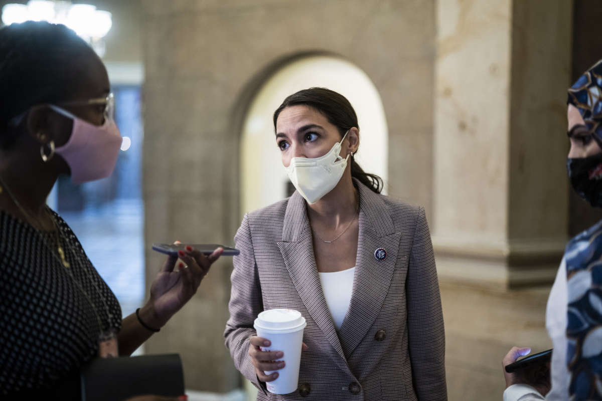 Rep. Alexandria Ocasio-Cortez (D-New York) speaks to a reporter on Capitol Hill on Thursday, July 29, 2021 in Washington, D.C.