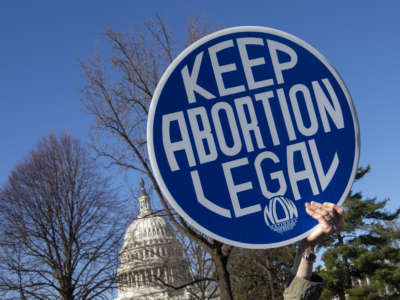 Pro-choice abortion activists protest during a demonstration outside the Supreme Court in Washington on March 4, 2020.