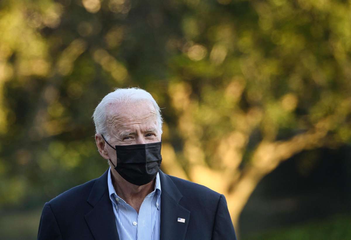 Joe Biden squints oldly at something
