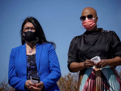 (L-R) Rep. Rashida Tlaib (D-Michigan) and Rep. Ayanna Pressley (D-Massachusetts) attend a news conference outside the U.S. Capitol on March 11, 2021 in Washington, D.C.