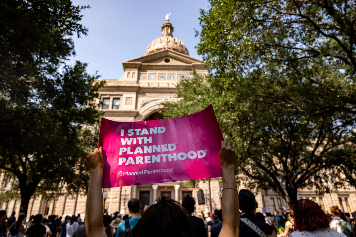 An abortion rights activist holds a sign in support of Planned Parenthood at a rally at the Texas State Capitol on September 11, 2021 in Austin, Texas.