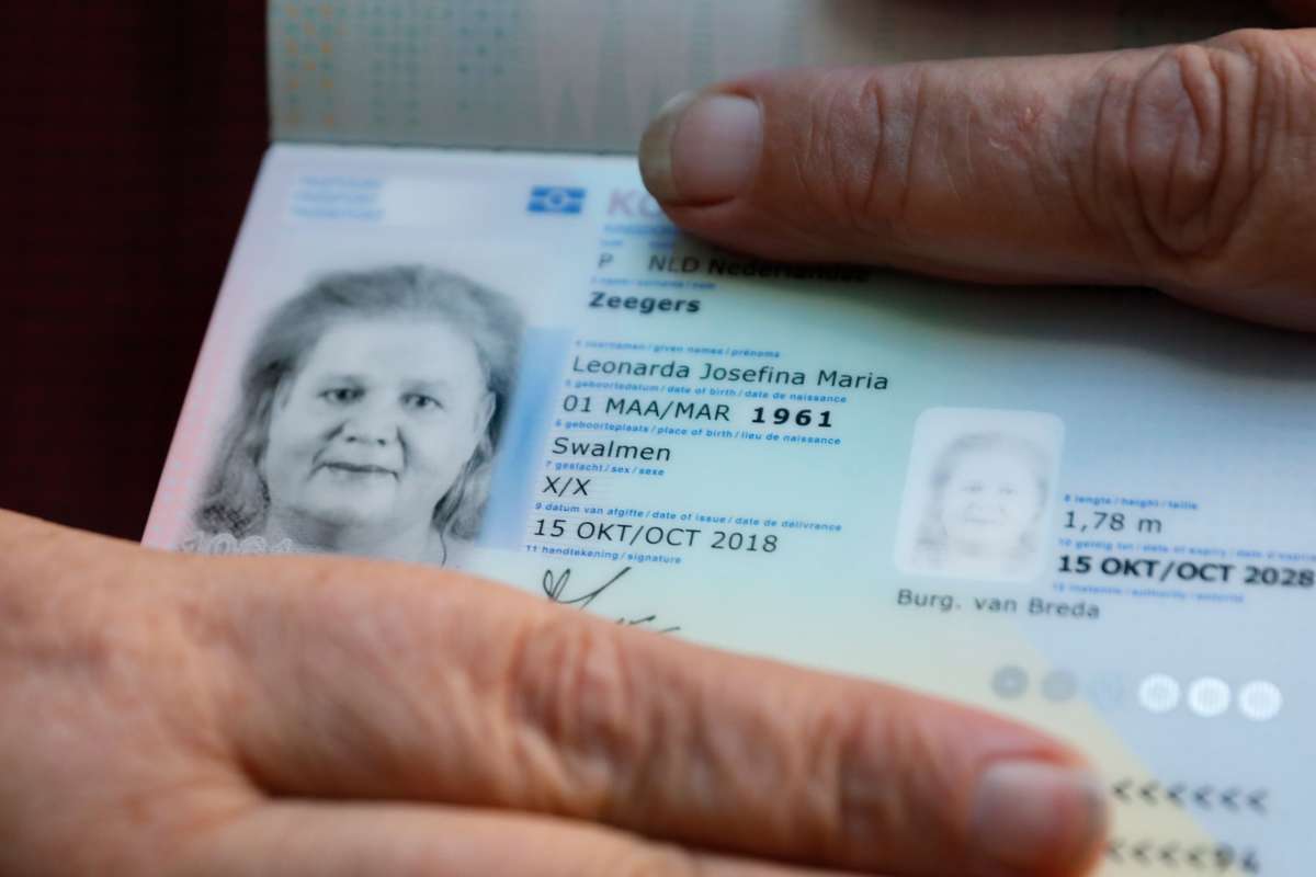 Leonne Zeegers, 57, receives the Netherland's first gender-neutral passport with the gender designation X on October 19, 2018.