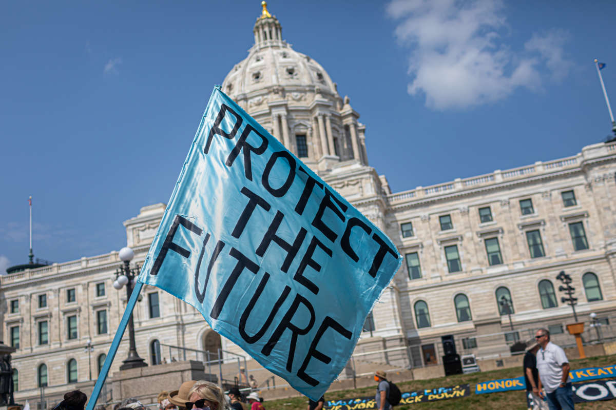 Indigenous leaders, Water Protectors and allies protest the Canadian oil-and-gas-transport company Enbridge, who are expanding the Line 3 pipeline, on August 25, 2021, in St. Paul, Minnesota.