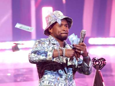 Host Usher speaks onstage at the 2021 iHeartRadio Music Awards at The Dolby Theatre in Los Angeles, California, which was broadcast live on Fox on May 27, 2021.