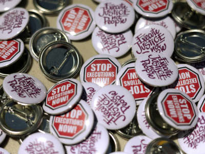 Buttons with anti-death penalty slogans are seen during a vigil against the death penalty in front of the U.S. Supreme Court on June 29, 2021, in Washington, D.C.